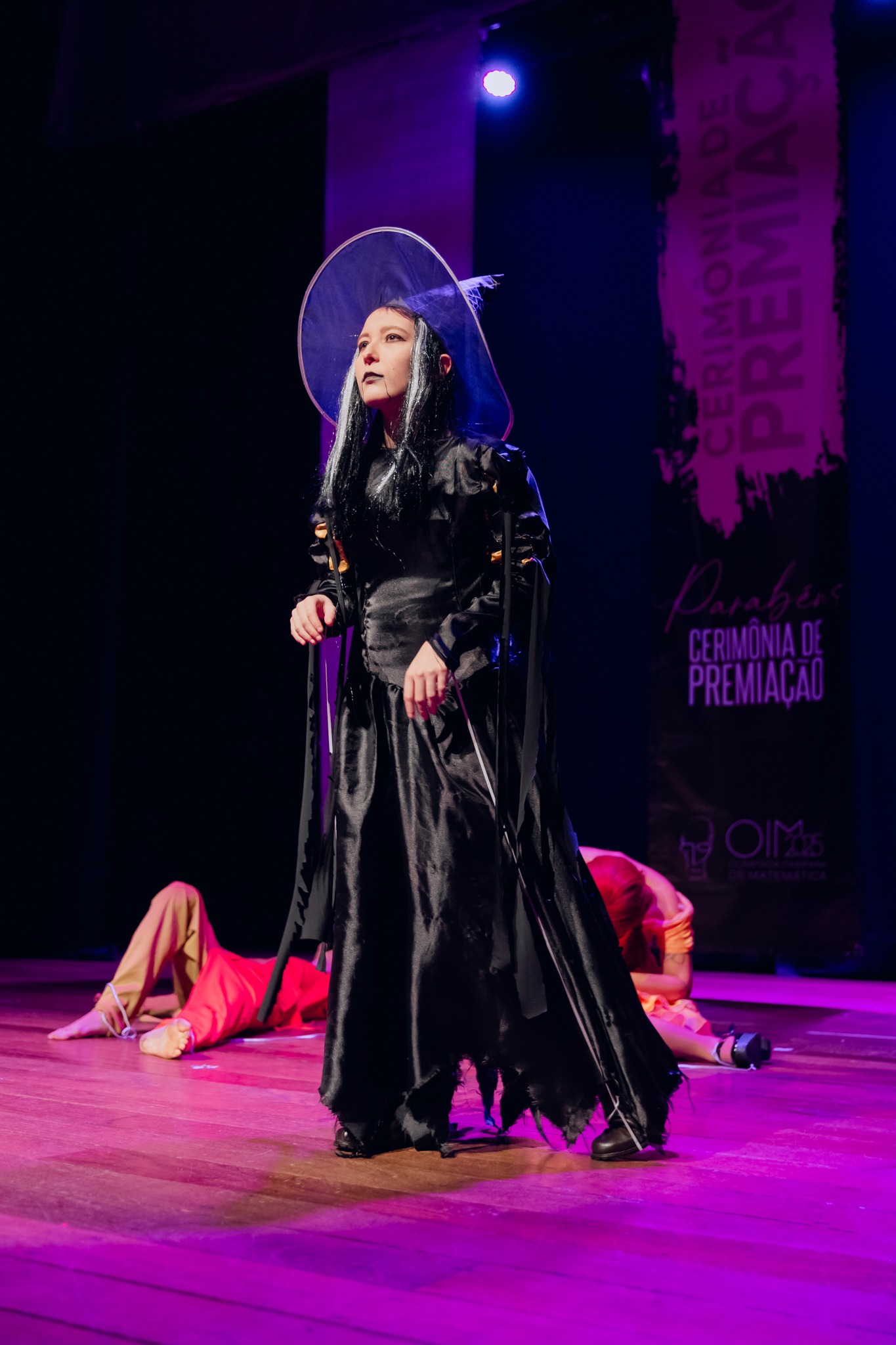 Premiação OIM 2025 - momento no palco